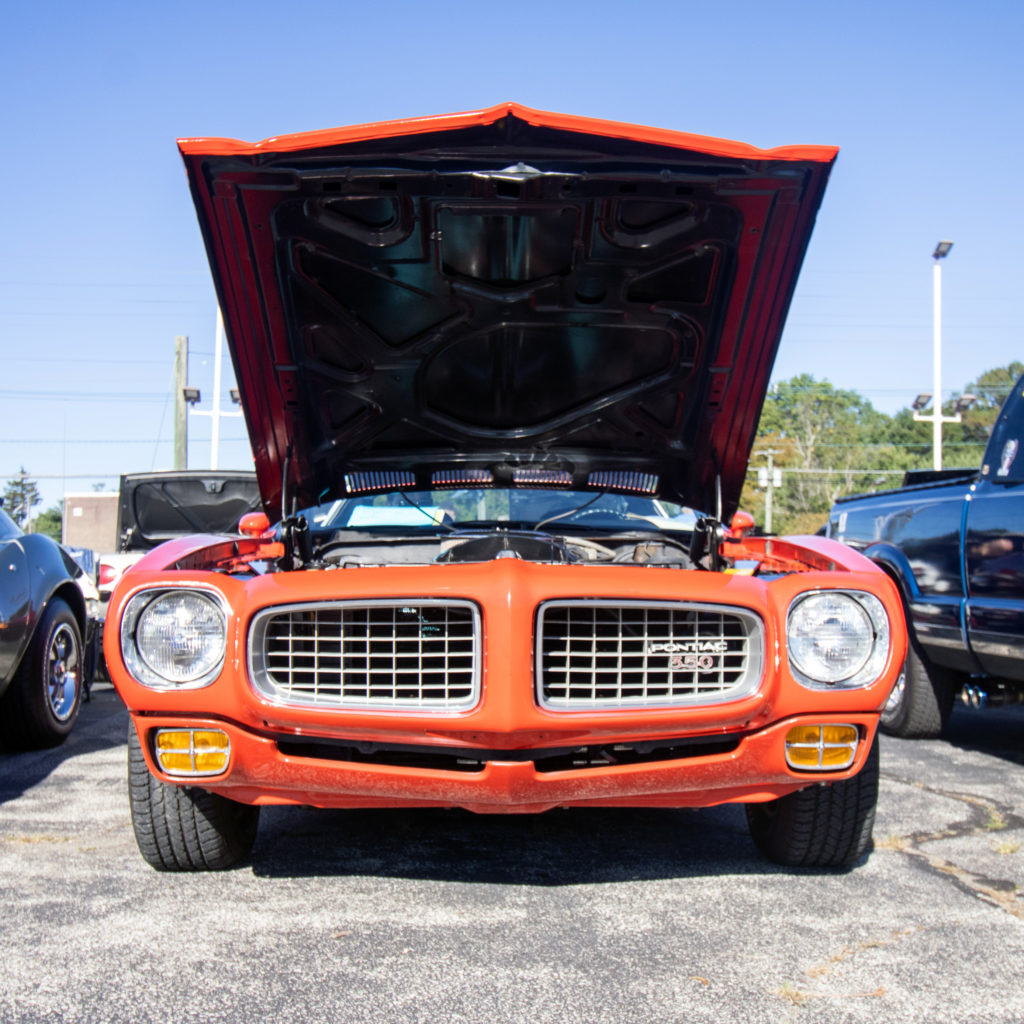 Vintage Pontiac Firebird at a Car Show